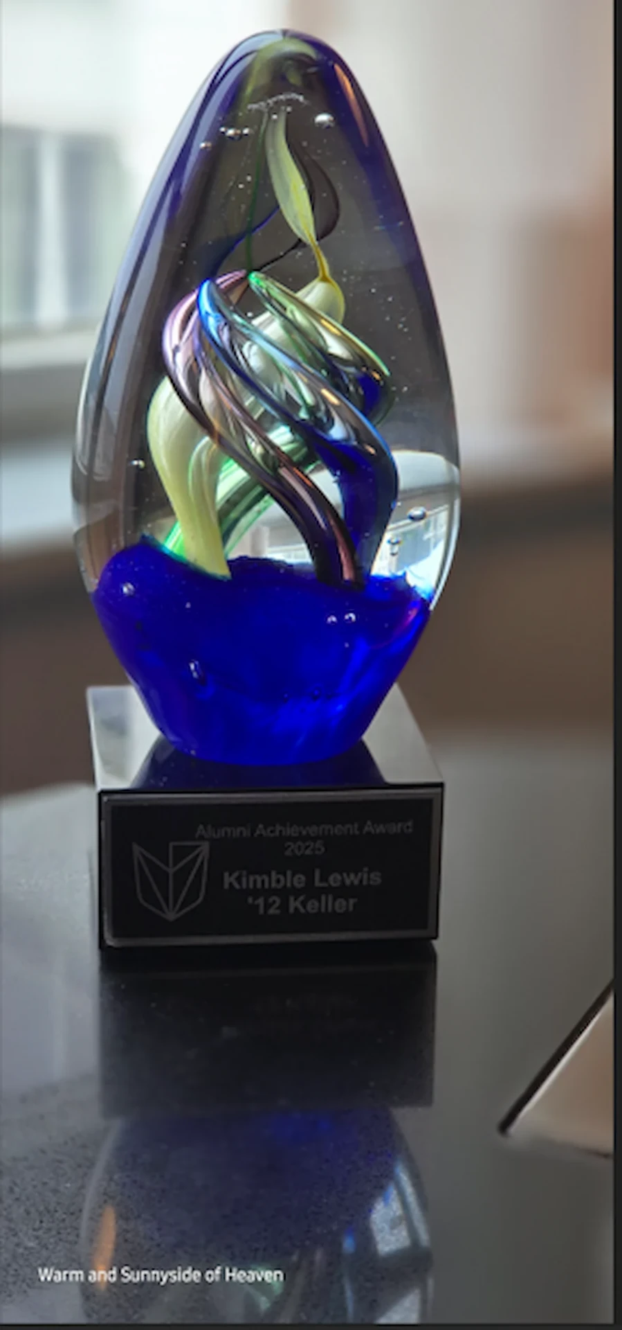 2025 Alumni Achievement Award trophy engraved for Kimble Lewis